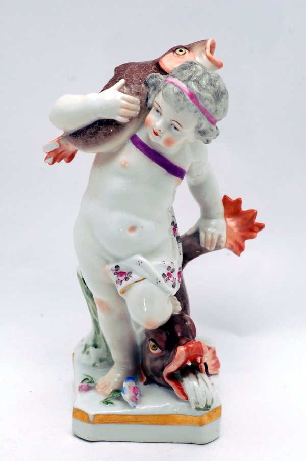 Appraisal: Meissen type porcelain figurine of child with fish marked under