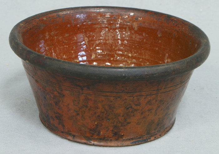 Appraisal: Redware bowl with manganese decoration glaze flaking on inside x