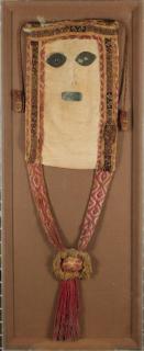 Appraisal: South American Folk Textile Head in Lucite Frame In the