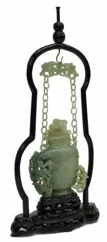 Appraisal: Burmese jadeite carving depicting a lidded jar with foo lion