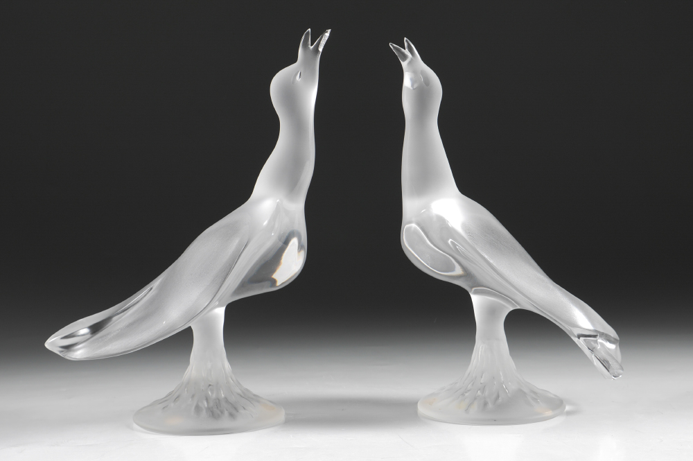 Appraisal: LALIQUE CRYSTAL PAIR OF BIRDS Two frosted crystal bird figures