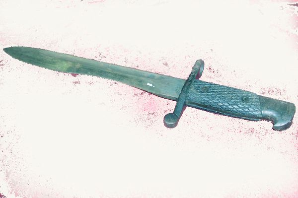 Appraisal: Military-Issue Wooden-Handled Knife bearing an engraved P with a cross-hatched