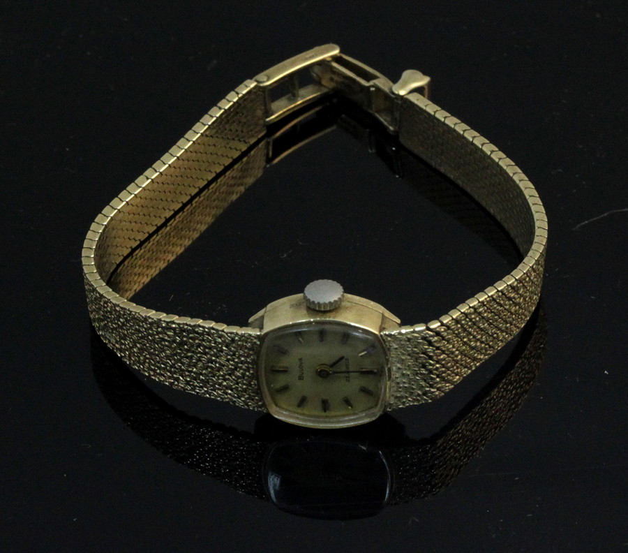 Appraisal: A lady's ct gold cased wristwatch the square dial signed