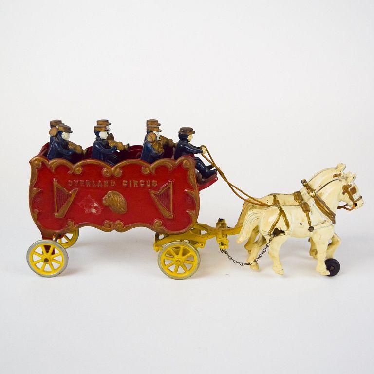 Appraisal: Kenton Overland Circus Band Wagon Painted cast iron wagon band