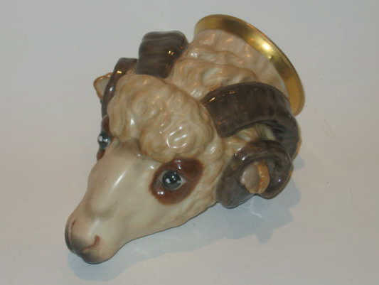 Appraisal: ENGLISH POTTERY STIRRUP CUP In the form of a ram's