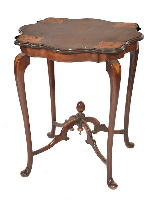 Appraisal: AN EDWARDIAN ART NOUVEAU MAHOGANY OCCASIONAL TABLE with inlaid shaped