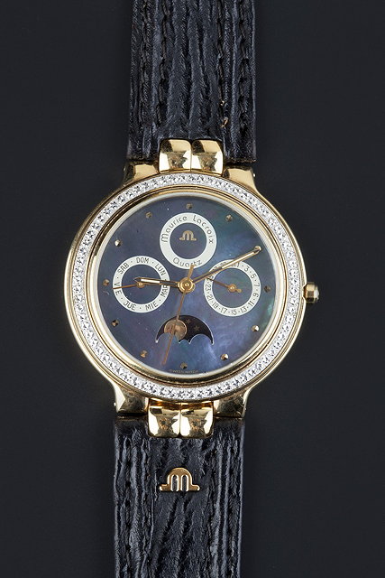 Appraisal: A chronograph wristwatch by Maurice Lacroix the circular signed mother