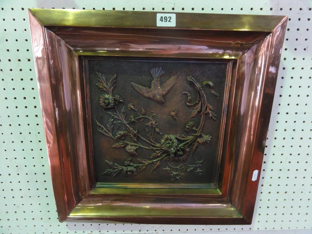 Appraisal: An oriental copper embossed panel of a bird swooping on