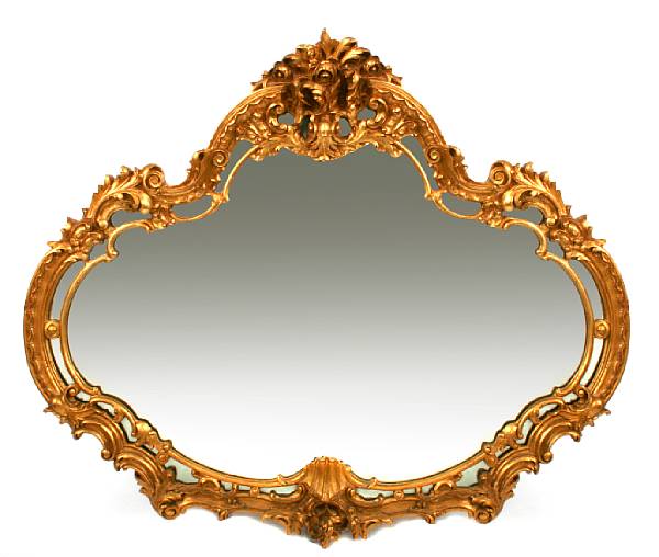 Appraisal: A Rococo style giltwood mirror modern height ft in width