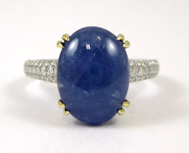 Appraisal: TANZANITE DIAMOND AND FOURTEEN KARAT GOLD RING The white and