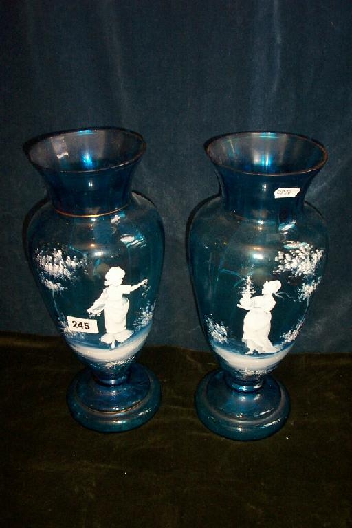 Appraisal: A pair of Victorian turquoise glass vases with painted Mary