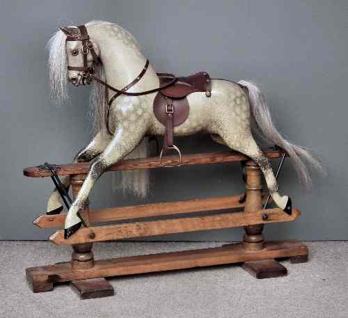 Appraisal: An early th Century Ayres grey dappled rocking horse with