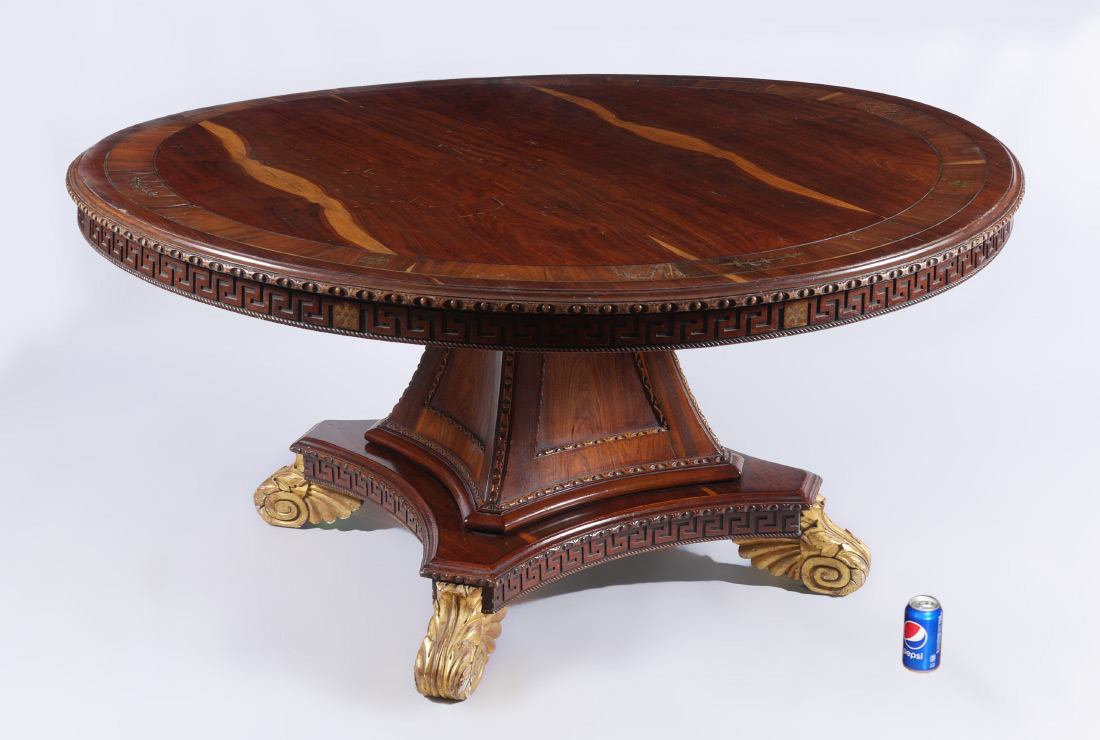 Appraisal: BOULLE INLAID CARVED ROUND LIBRARY TABLE Round top with ring