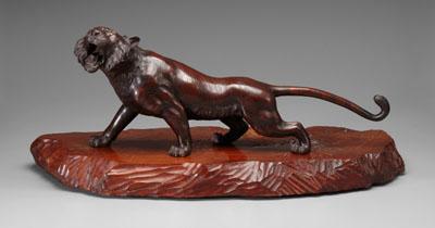 Appraisal: Japanese bronze tiger dark brown patina inlaid glass eyes finely