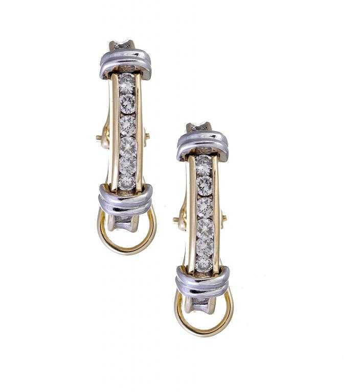 Appraisal: A PAIR OF TWO COLOUR GOLD AND DIAMOND SET EARRINGS