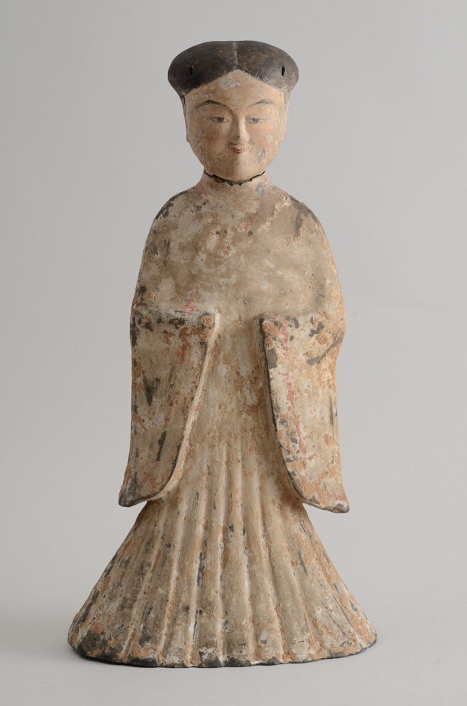 Appraisal: CHINESE TANG TYPE POTTERY FIGURE OF A FEMALE MOURNER Wearing