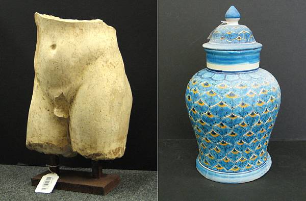 Appraisal: A painted composition male torso and an earthenware covered jar