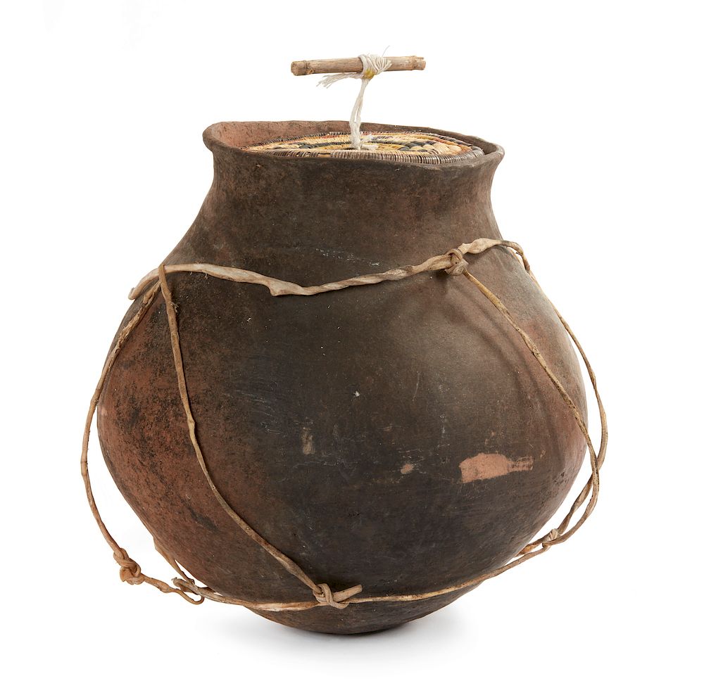 Appraisal: Tarahumara Clay Pot with Leather Straps and Lid Tarahumara Clay