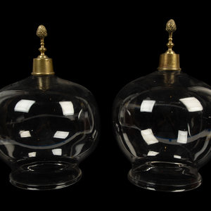 Appraisal: A Near Pair of English Gilt Metal Mounted Glass Cloches