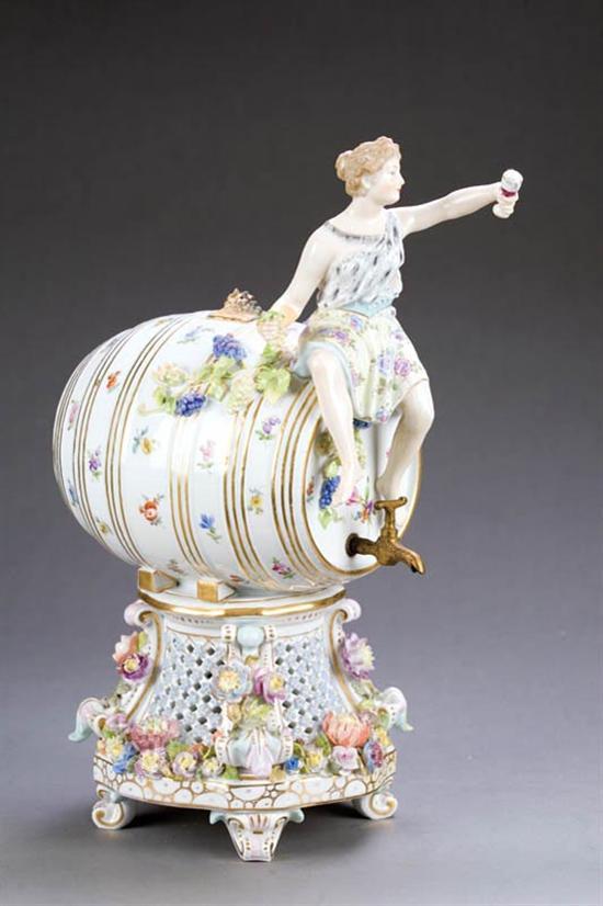 Appraisal: PORCELAIN WINE KEG WITH FIGURE Germany th century porcelain Hand