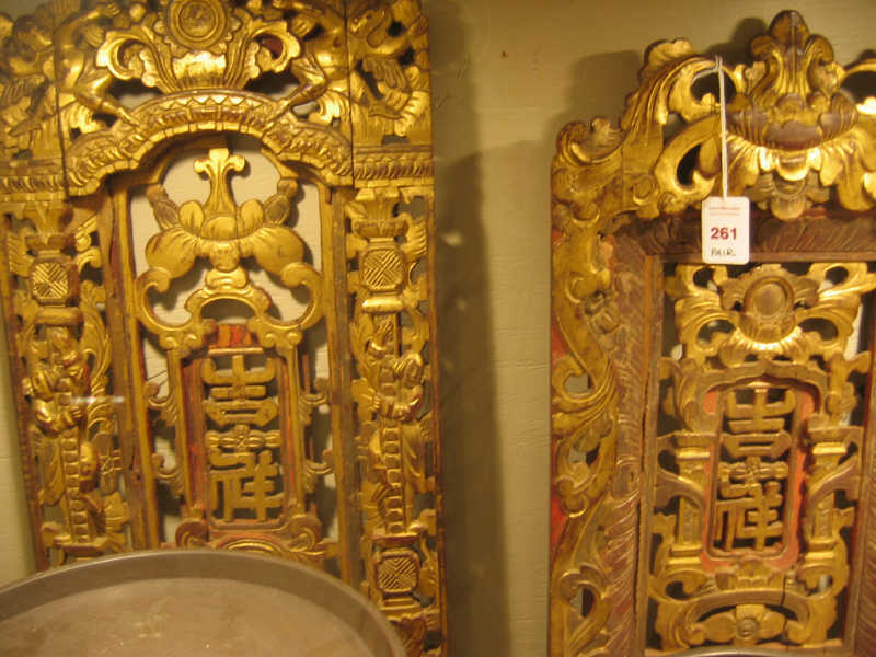 Appraisal: PAIR CHINESE CARVED GILT WOOD PLAQUES The rectangular carved gilt