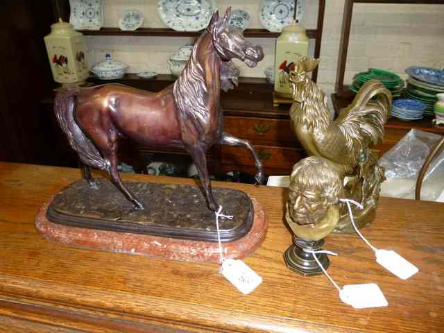 Appraisal: A BRONZE FIGURE OF A HORSE on a marble base