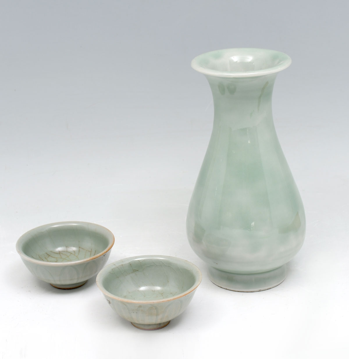 Appraisal: PIECE CHINESE CELADON VASE AND LOTUS BOWLS Comprising - Green