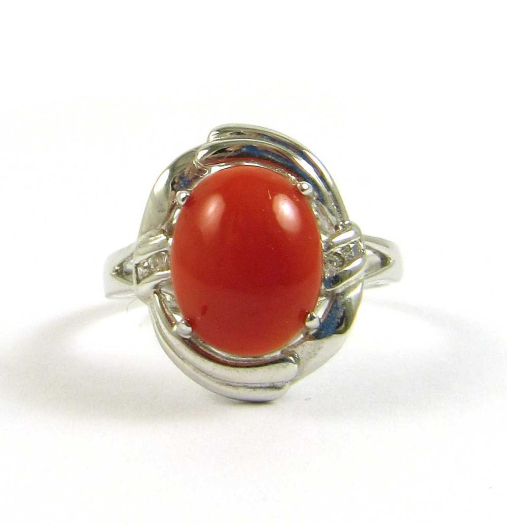 Appraisal: CORAL DIAMOND AND FOURTEEN KARAT GOLD RING The k white