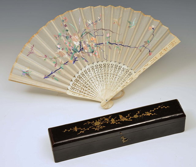 Appraisal: A CHINESE FAN with embroidered flowers and foliage on silk