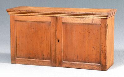 Appraisal: English pine panel-door cupboard molded top and two paneled doors