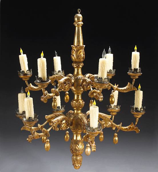 Appraisal: An Italian Neoclassical giltwood twelve light chandelier th century The