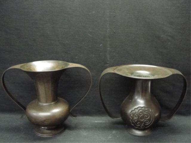 Appraisal: Bronze Asian Handled Vases with decoration signed From an East