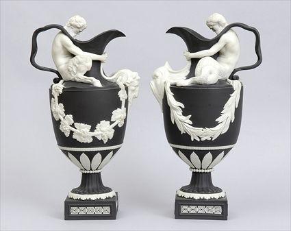 Appraisal: PAIR OF WEDGWOOD LIMITED EDITION BLACK JASPERWARE WINE EWERS SACRED