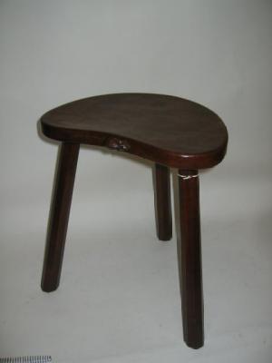 Appraisal: AN ADZED OAK STOOL by Robert Mouseman Thompson the kidney