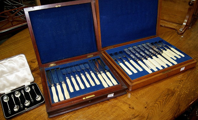 Appraisal: Cased set of twelve silver plated and bone handled fish