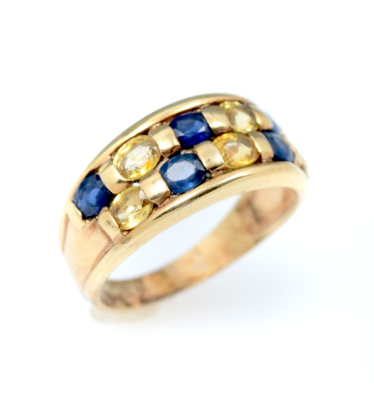 Appraisal: K BLUE YELLOW SAPPHIRE RING K yellow gold ring contains