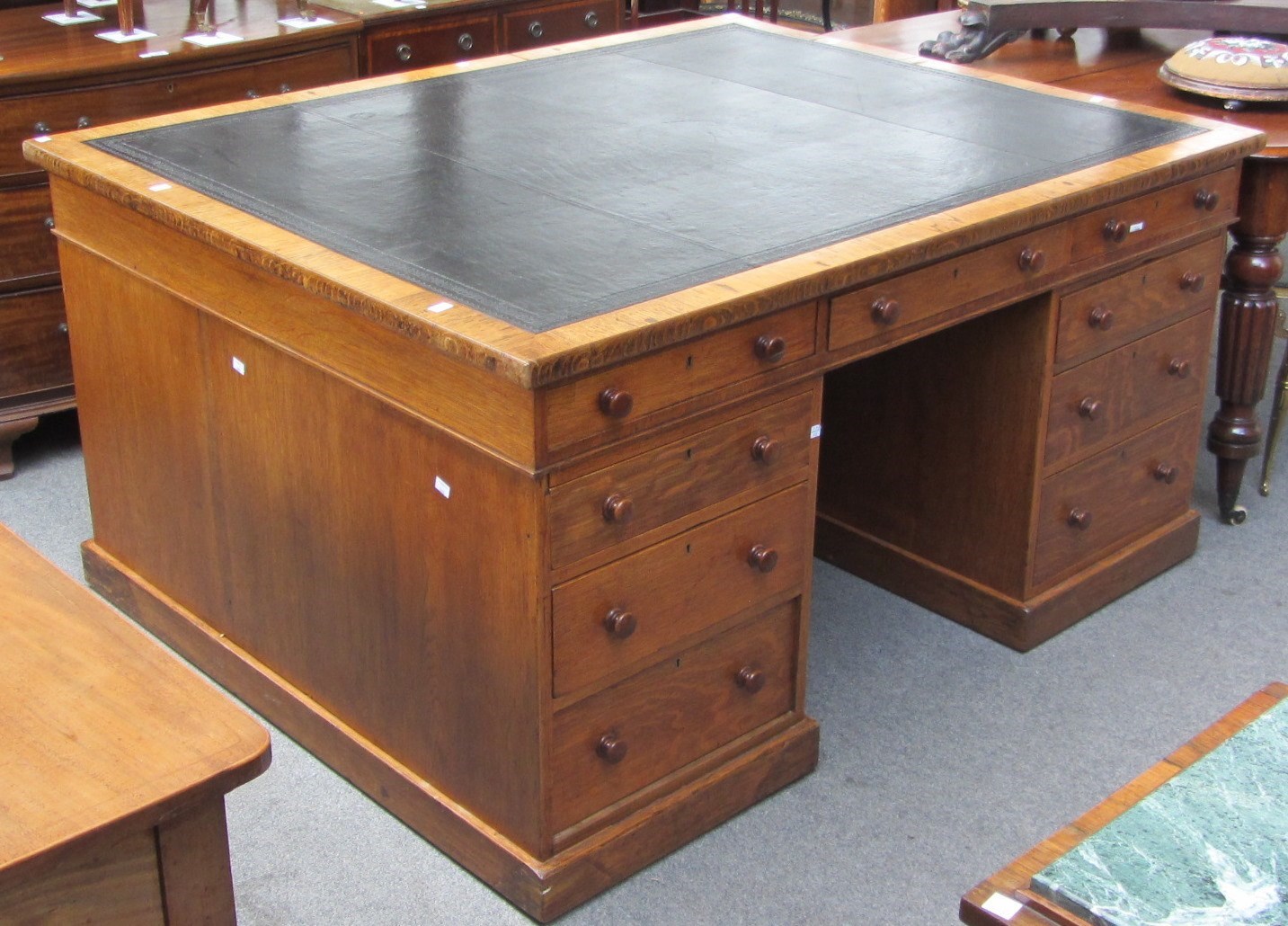 Appraisal: A Victorian oak partners desk with nine drawers about the