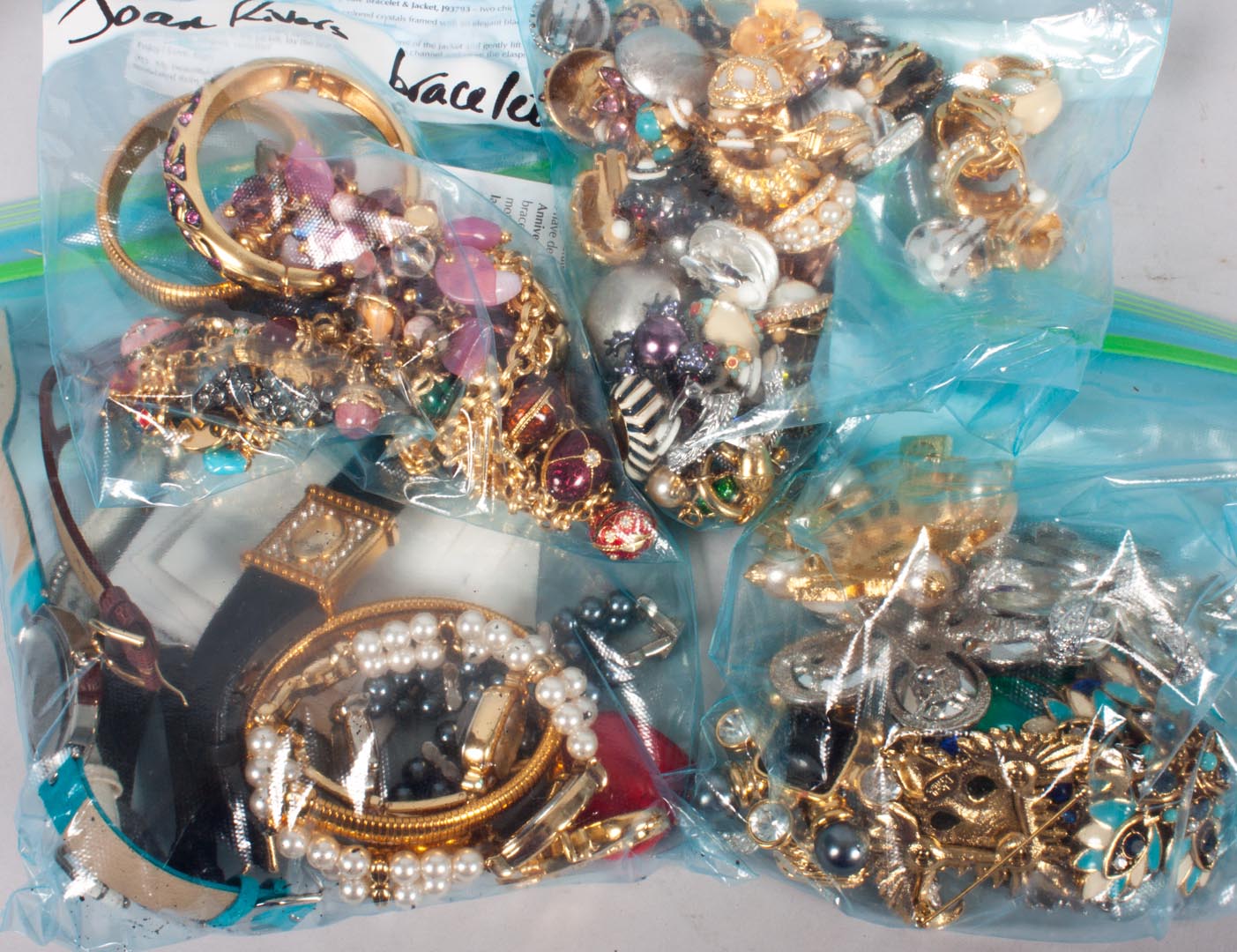 Appraisal: Large bag of assorted Joan Rivers costume jewelry including pins