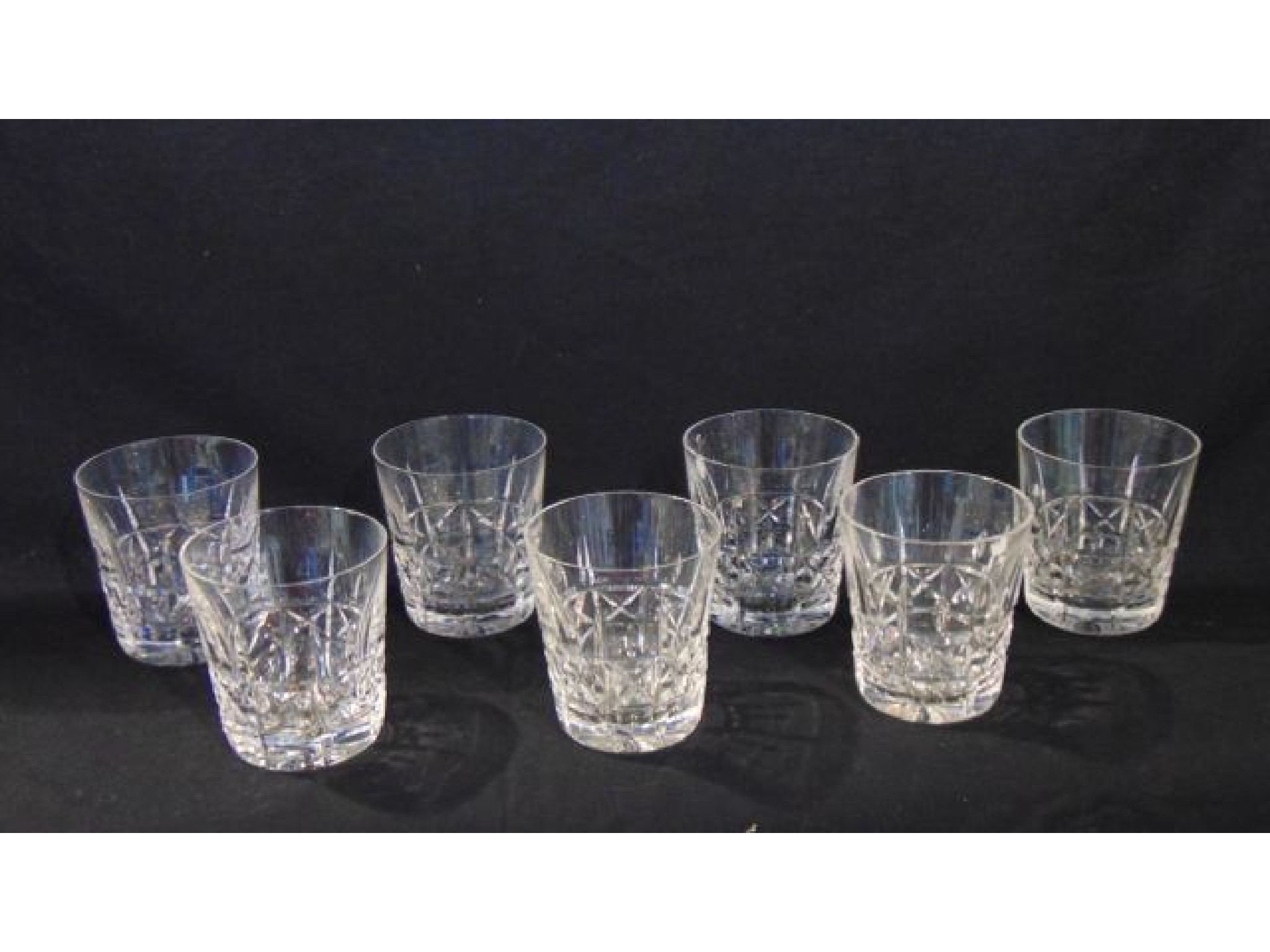 Appraisal: Seven Waterford clear cut crystal tumblers with vertical and further