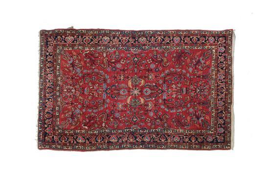 Appraisal: ORIENTAL RUG First half - th century Sarouk Burgundy ground