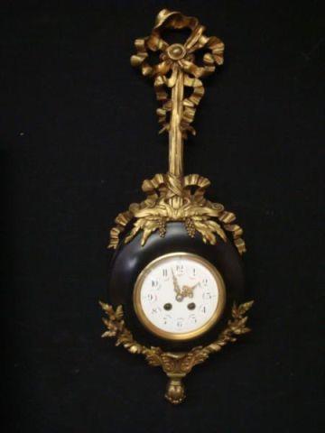 Appraisal: Gilt and Black Metal Ribbon-Form French Clock with hand painted