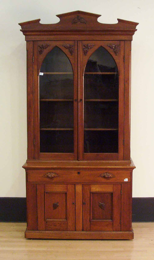 Appraisal: Victorian walnut two piece bookcase h x w