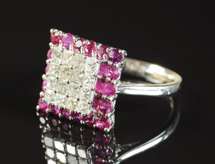 Appraisal: DIAMOND RUBY AND EIGHTEEN KARAT WHITE GOLD RING set with