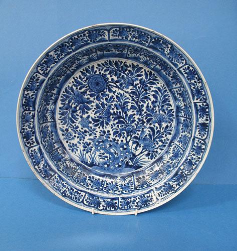 Appraisal: A CHINESE BLUE AND WHITE BASIN of shallow form decorated