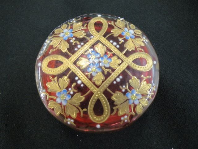 Appraisal: Enameled Cranberry Art Glass Dresser Box gold and floral diameter