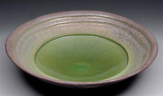 Appraisal: A JOHN DUNN LARGE BOWL in a green crackled lustre