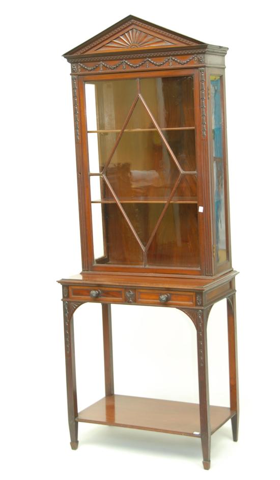 Appraisal: TH C MAHOGANY CURIO Cabinet adam style with carved crown