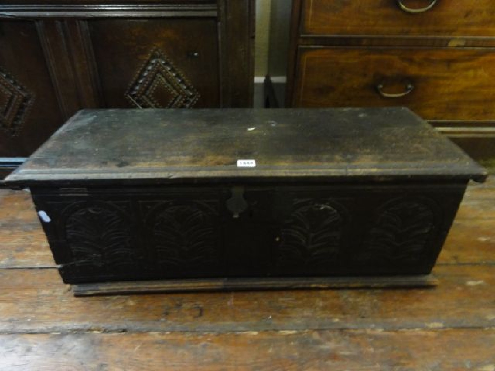 Appraisal: An unusually small antique oak coffer with carved foliate detail