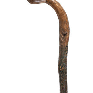 Appraisal: Northeastern Chip-Carved Effigy Cane early th century handle carved in