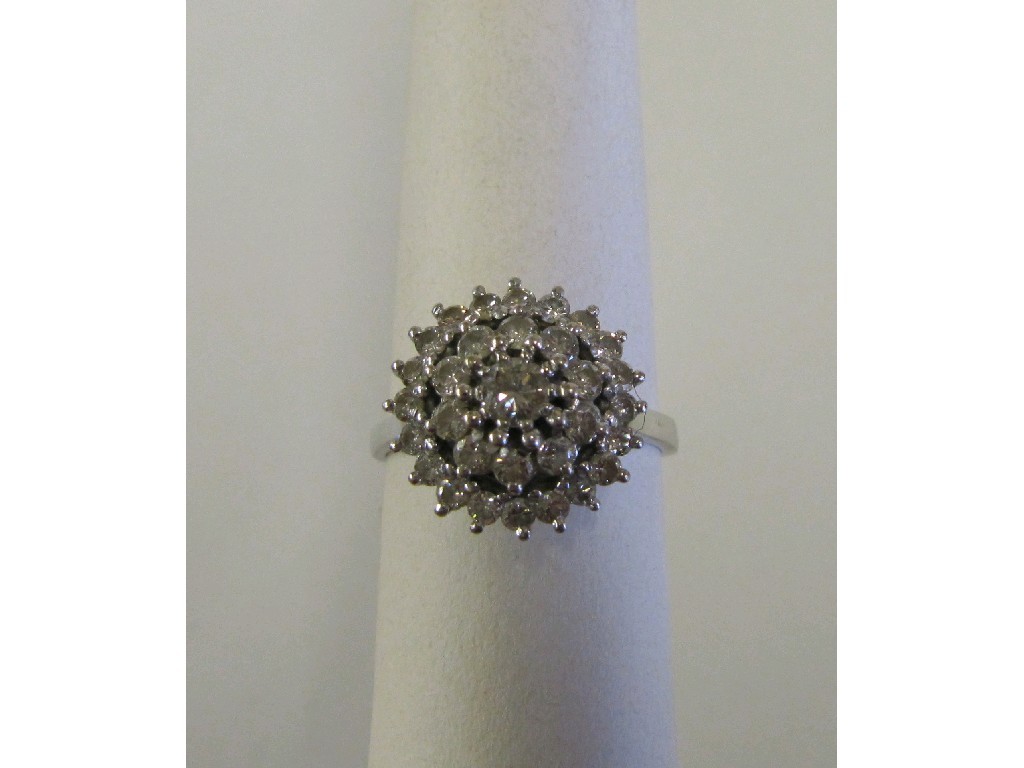 Appraisal: White metal diamond cluster ring with brilliant cut diamonds in